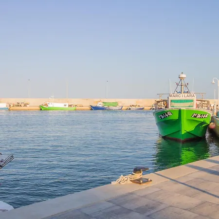 En El Puerto De إليامبويا